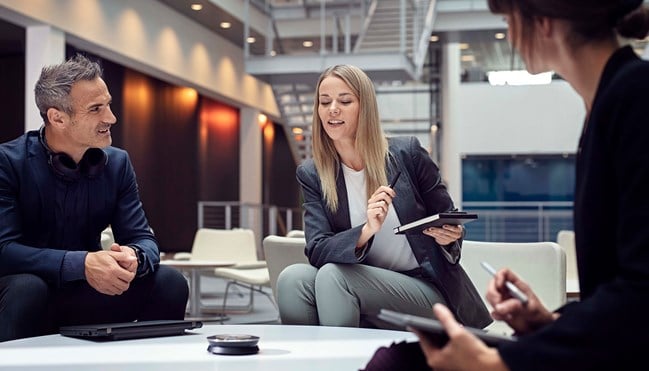 EXPAND 30 on a table during a meeting